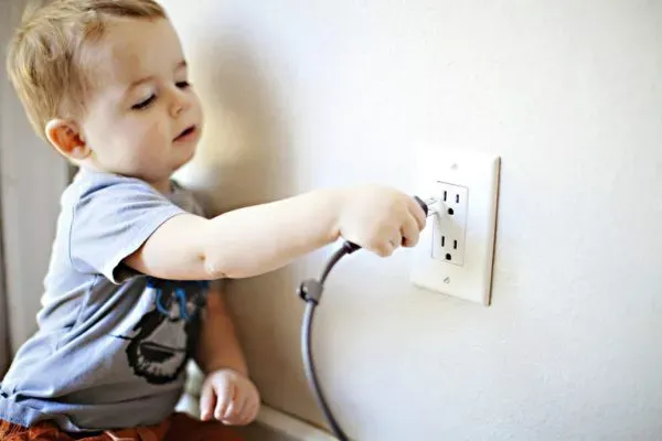 boy and 3-Prong Electrical Outlets-wowsocket